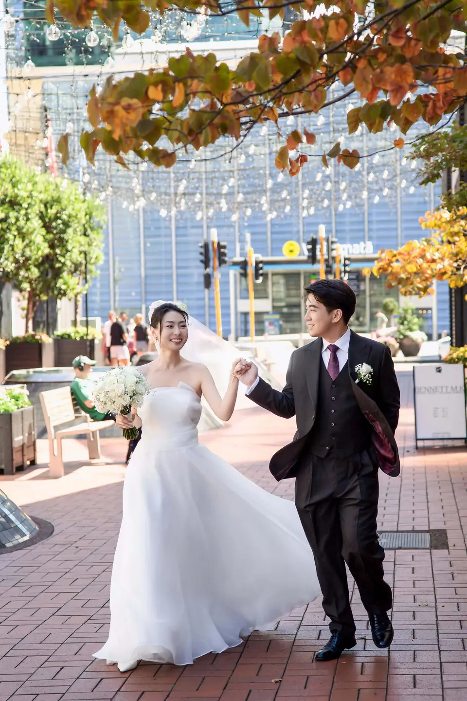 Bryan wearing a white rose and baby’s breath wedding buttonhole