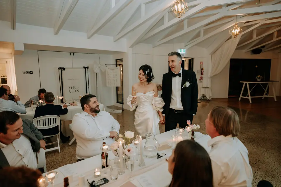 Elegant Auckland wedding reception with soft blush and ivory floral styling