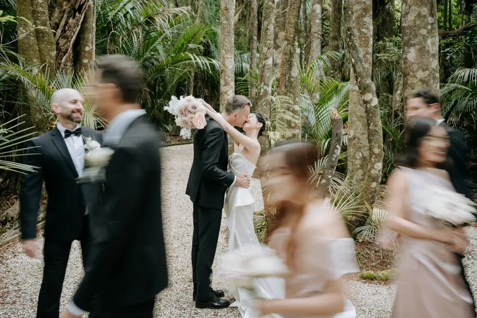 Elegant bridal bouquet in soft white, ivory and blush tones for a modern Auckland wedding
