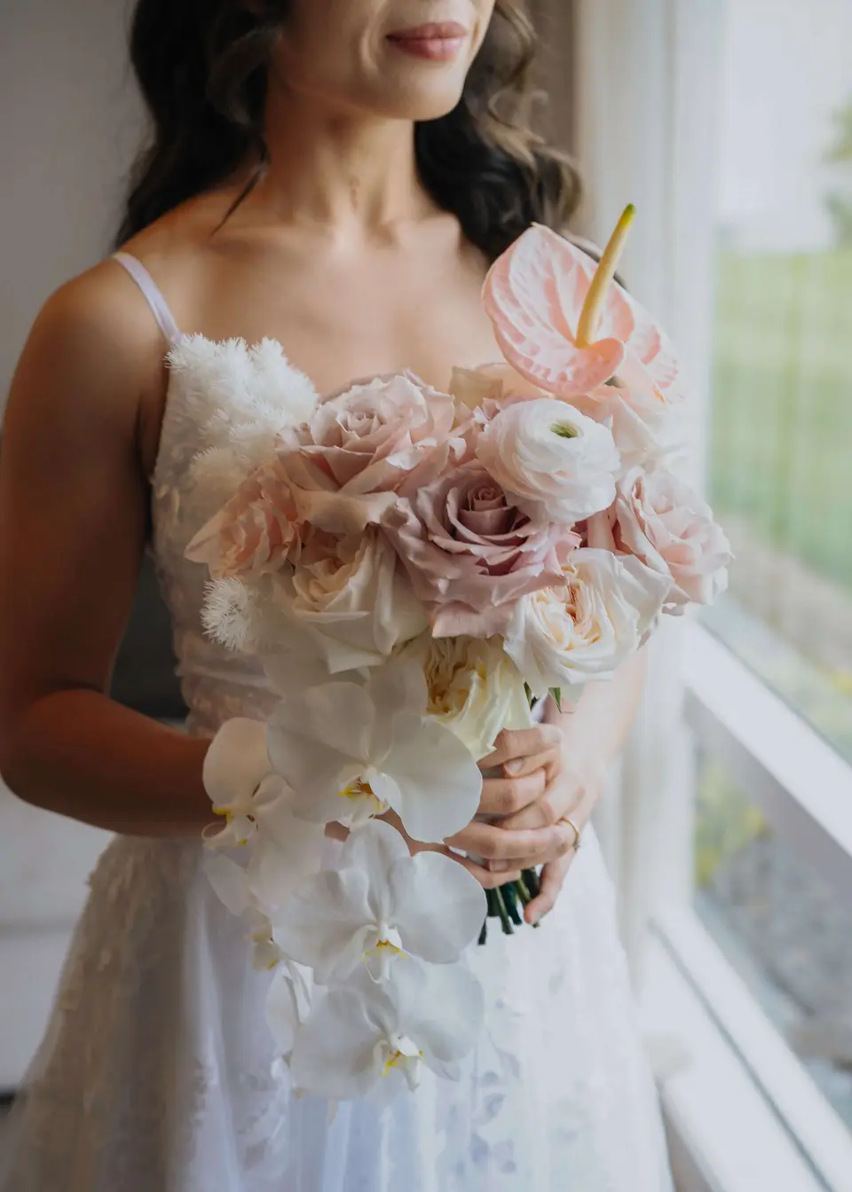 Flower-only bridal bouquet with blush roses, white blooms and Phalaenopsis orchids by Auckland wedding florist Willow and Peony