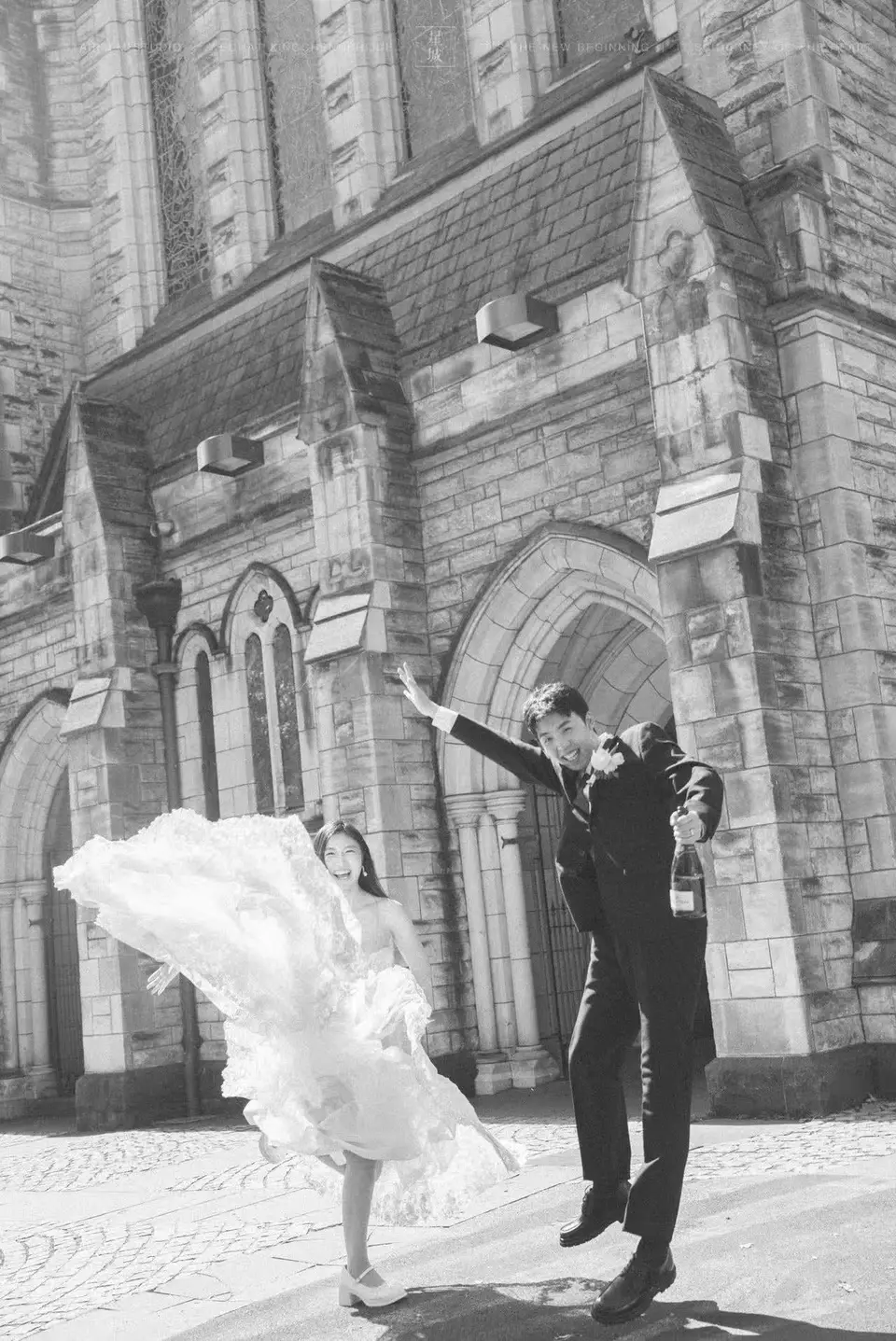Kaelan and Tongtong celebrating outside St Matthew-in-the-City in Auckland