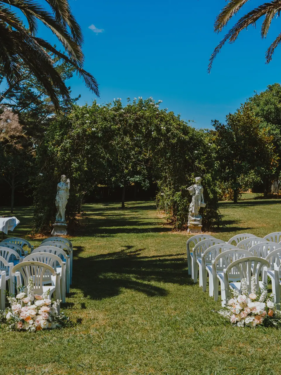 Bud vases and candles styled for a wedding reception