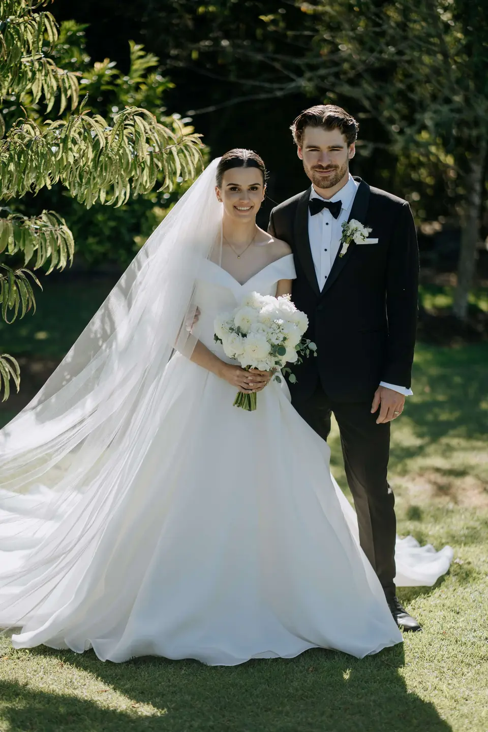 White and green wedding flowers at Riley’s family estate